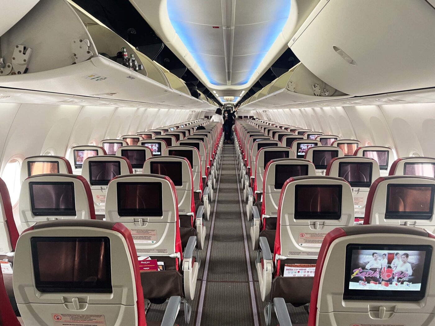 Inside empty Batik Air cabin, economy seats shown.