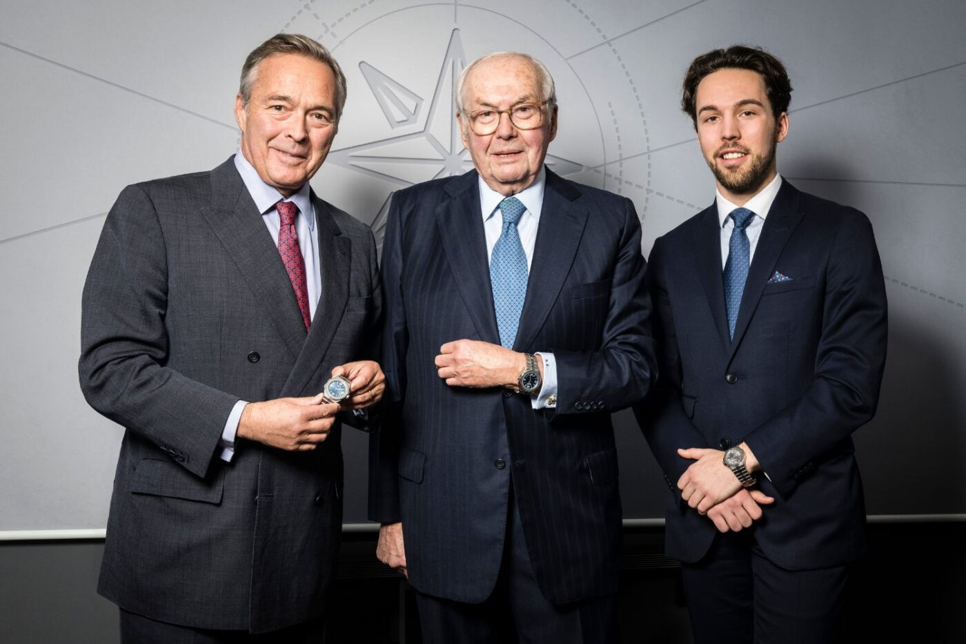 Three men showing Chopard watches.