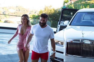 A couple exits luxury car like Dan Bilzerian.