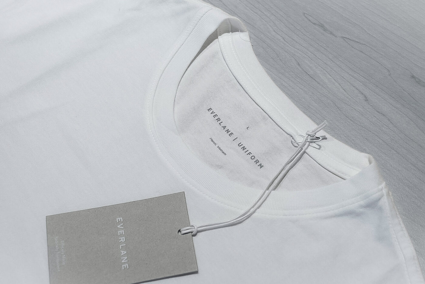 Everlane white tee collar and label close up 