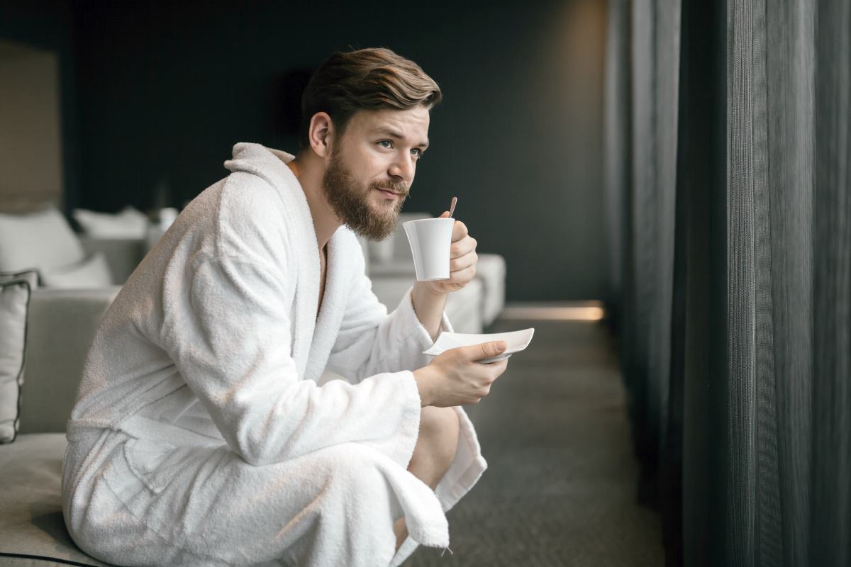 Gentleman in luxury bathrobe relaxing.