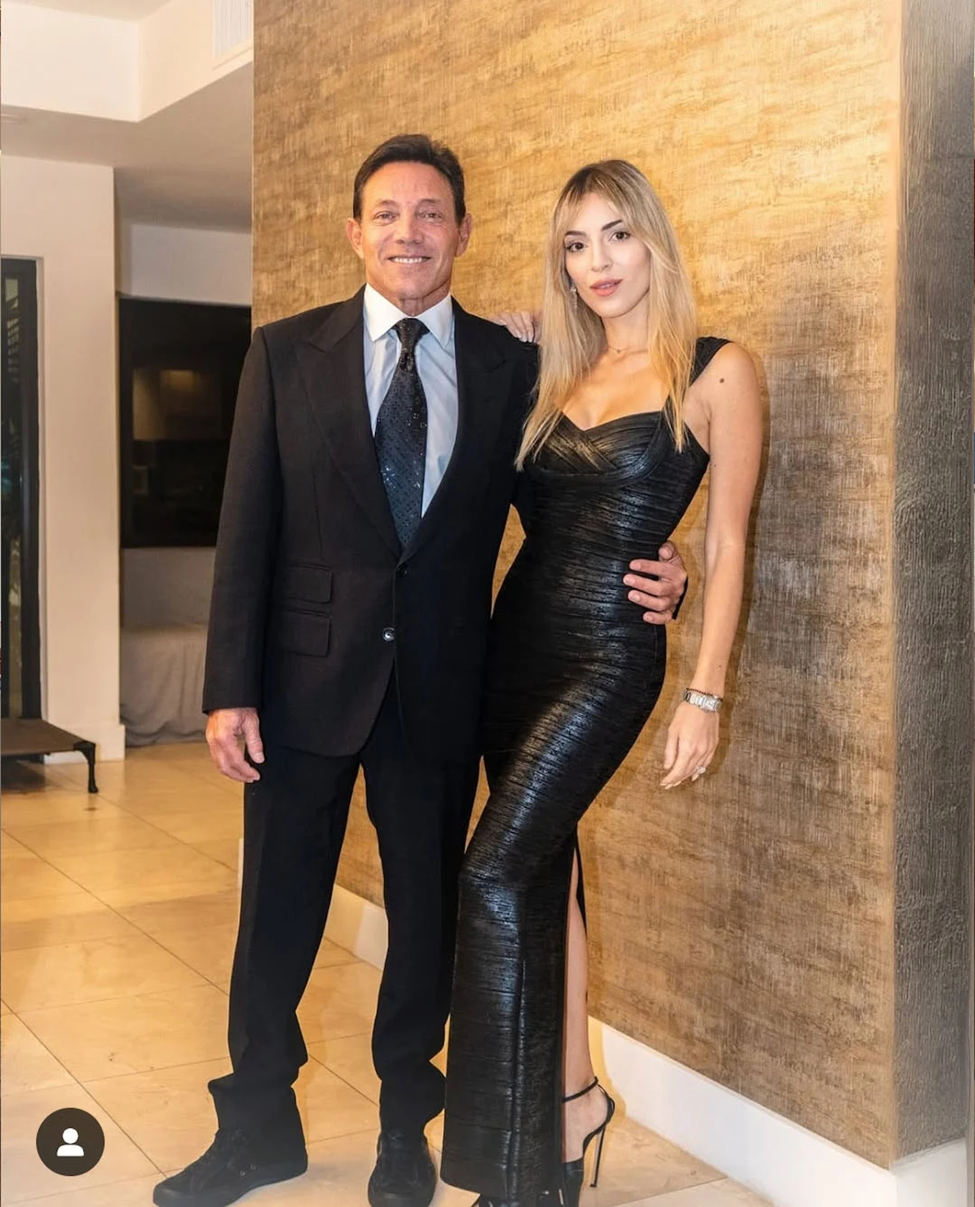 Jordan Belfort wearing poorly tailored pants.