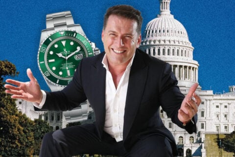 Man in suit near U.S. Capitol, Karl Stefanovic-like, with Rolex Hulk.