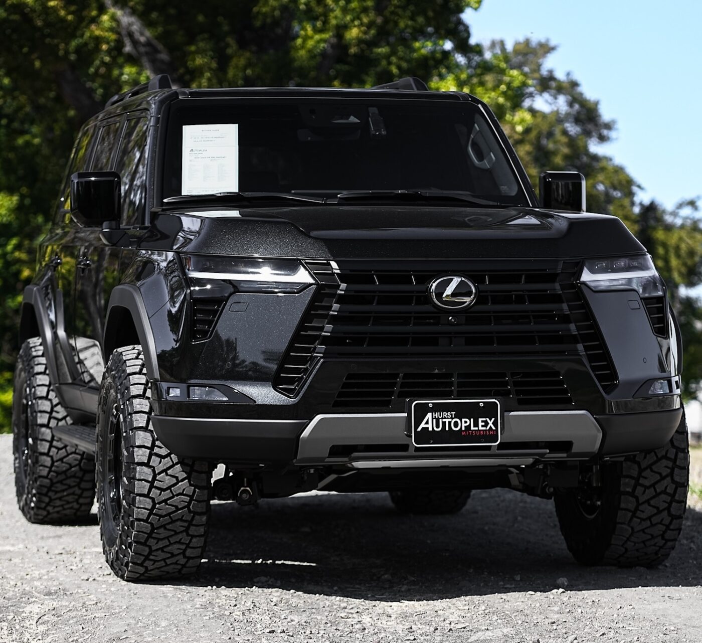 Lexus GX550 SUV parked on gravel in Australia.