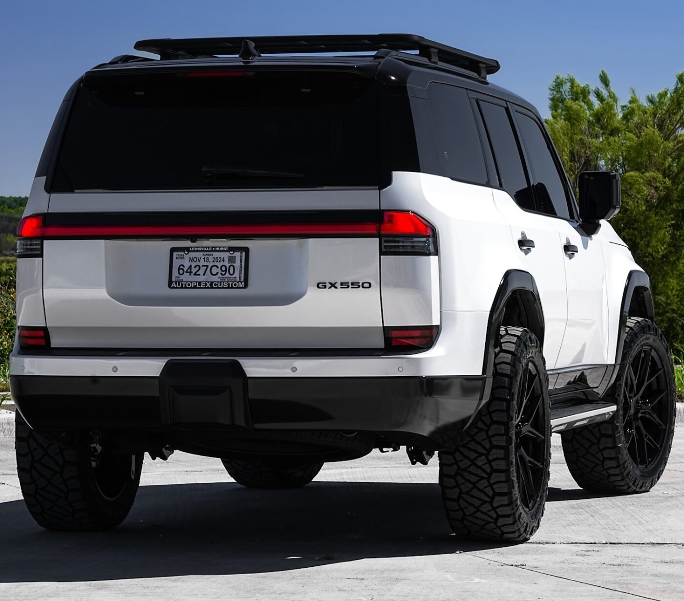 White Lexus GX550 SUV with black trim.