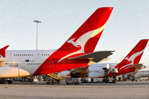 Qantas A380s at airport with kangaroo tails.