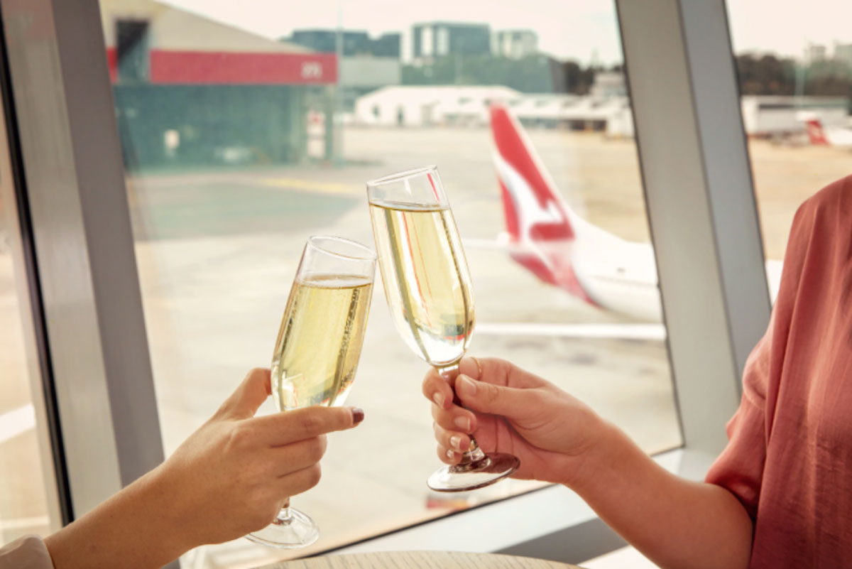 Qantas celebration: champagne at airport.