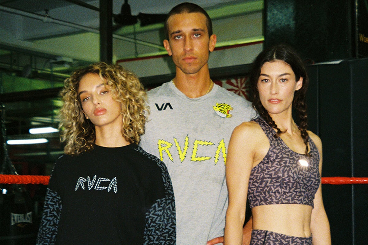 Three people in RVCA at the gym.