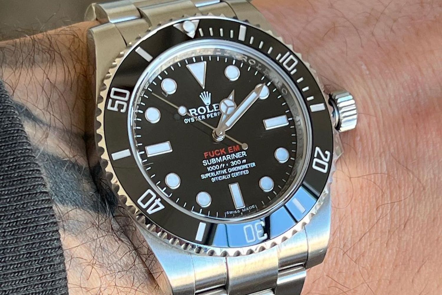 Rolex Submariner: Supreme-modified watch with unique branding.