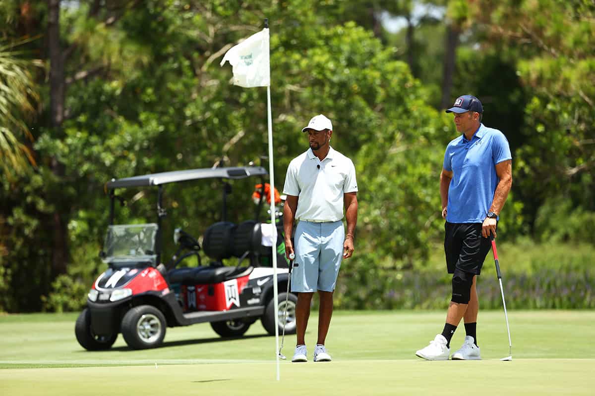 Men golfing, Pilot's Watch visible.