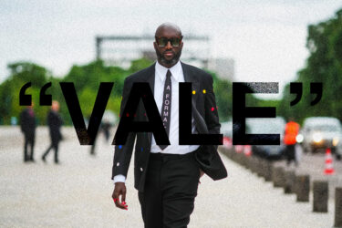 Person in suit embodies Virgil Abloh's style.