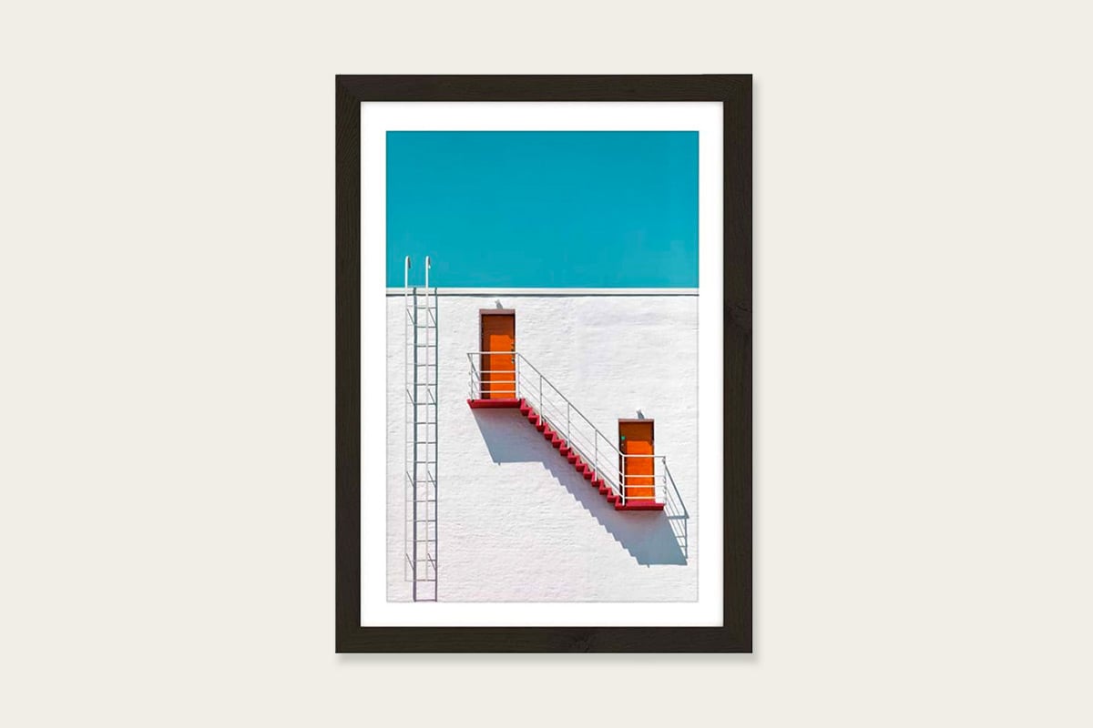 Red staircase photo wall art.