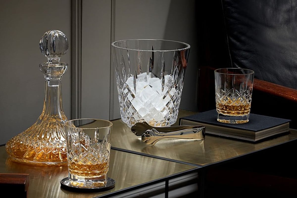 Crystal decanter, tumbler, ice bucket.