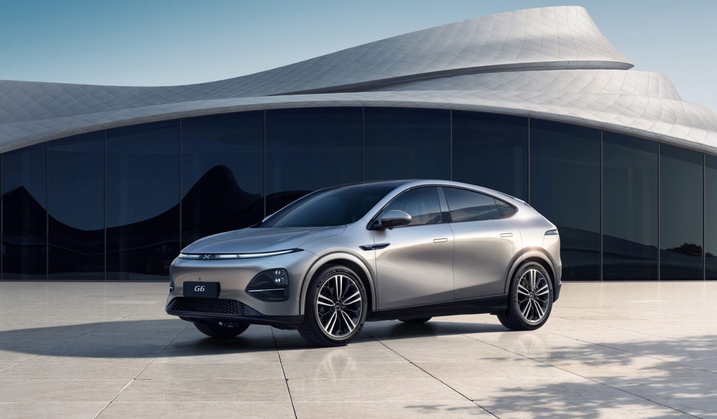 Sleek silver electric car in Australia parked.